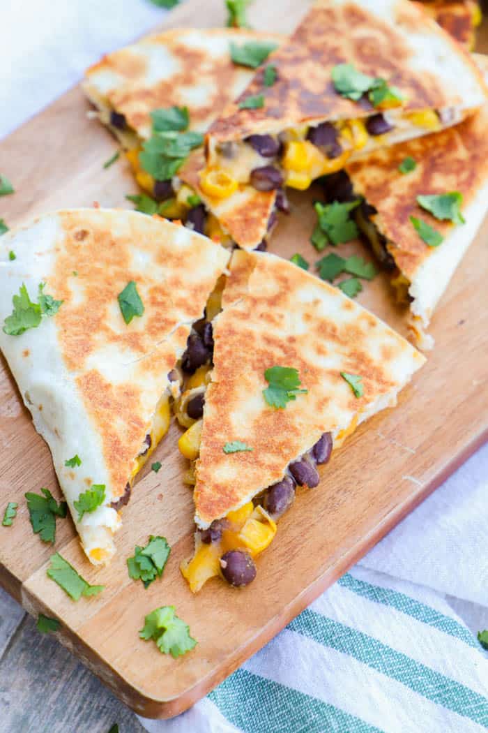 Black Bean and Cheese Quesadillas on wooden serving board