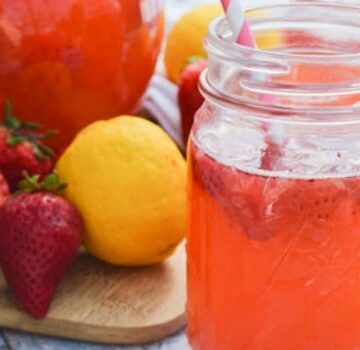This simple Strawberry Lemonade is the perfect summer drink and is made with two simple ingredients. It's perfect for summer days and what we will be making all season long.  