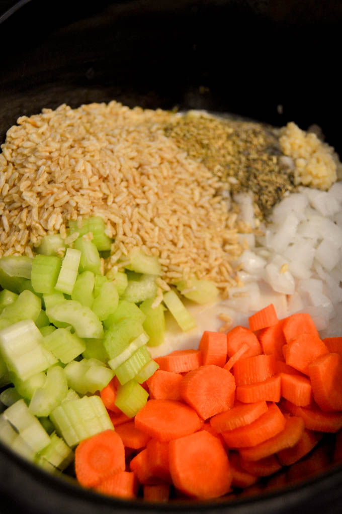 Slow Cooker Creamy Chicken and Rice Soup ingredients in the slow cooker