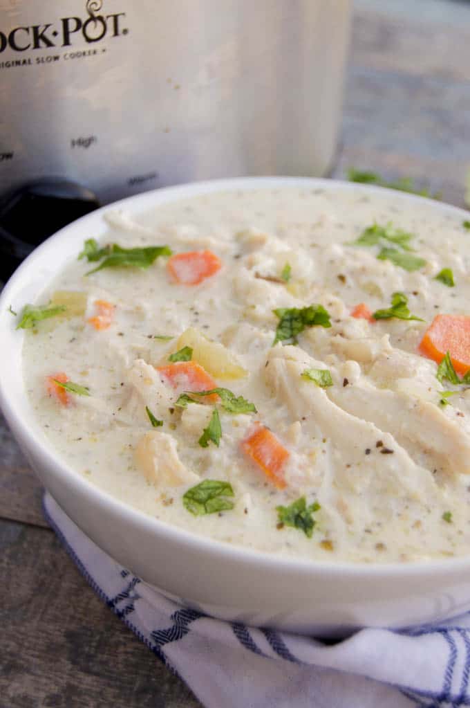 Slow Cooker Creamy Chicken and Rice Soup in a white bowl