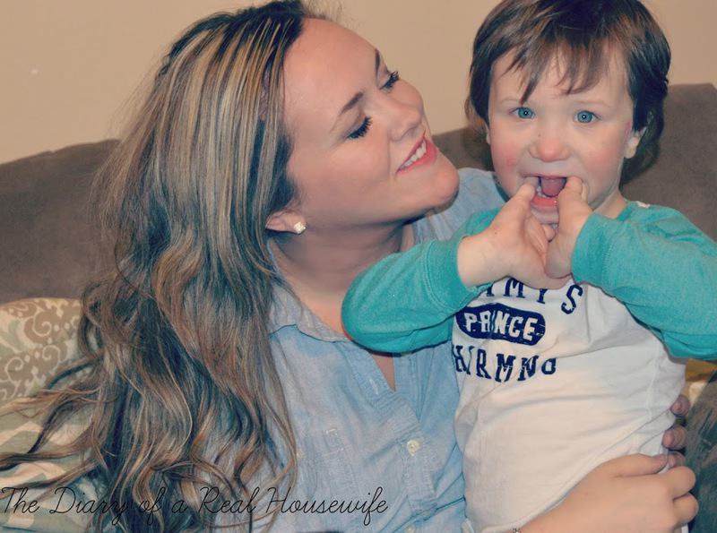 Mother hugging smiling son with cerebral palsy