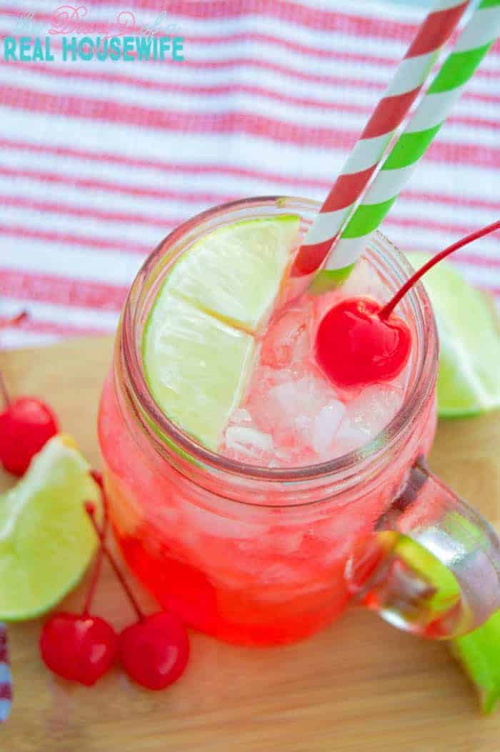 Cherry Limeade closeup with lime slice and cherries