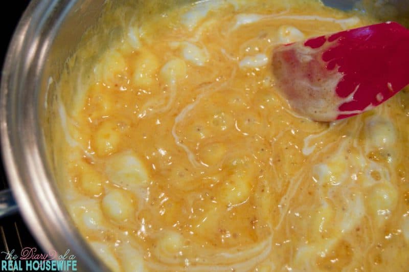 melting Pumpkin Spice Rice Krispies Treats in a pan