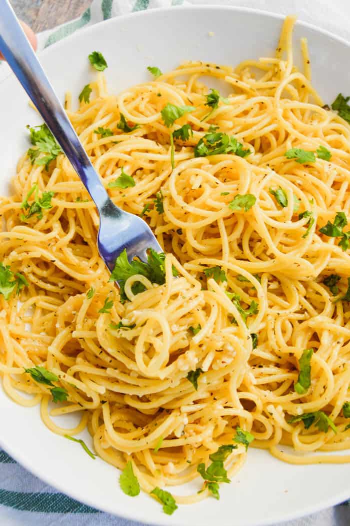 5 Ingredient Parmesan Garlic Spaghetti with a silver fork