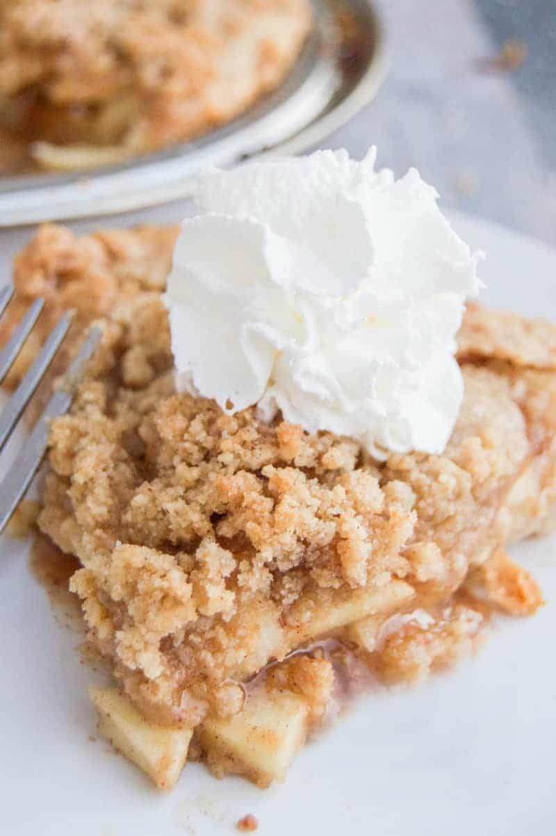 dutch apple pie with whipped cream on top