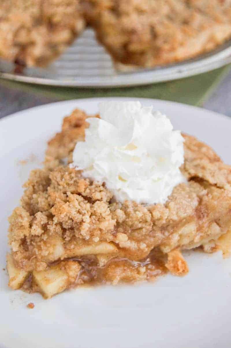 dutch apple pie on a white plate