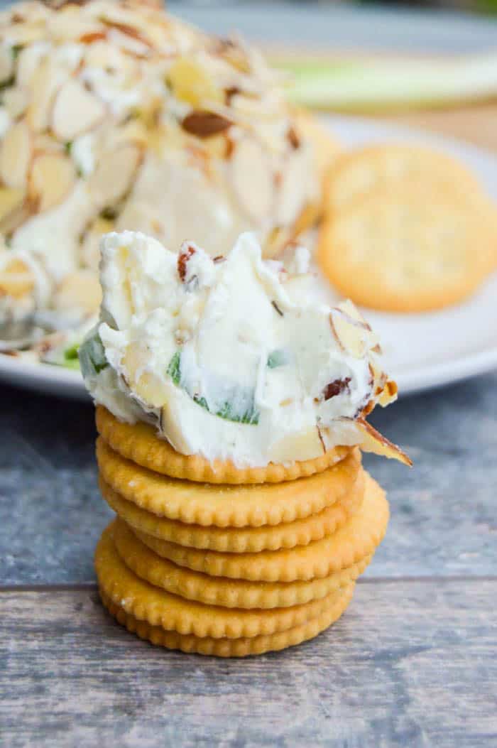Bacon Ranch Cheese Ball spread on a cracker