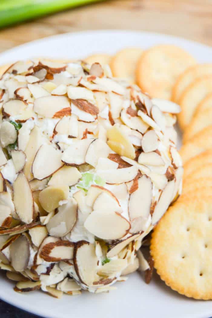 Bacon Ranch Cheese Ball on a plate with ritz style crackers
