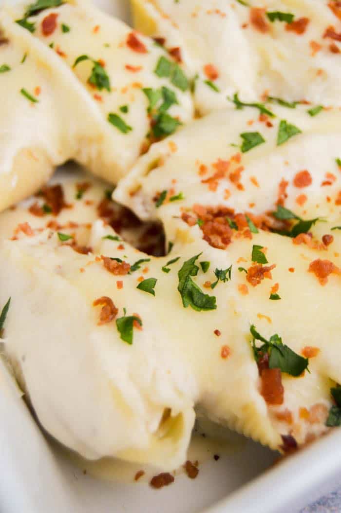 Chicken Alfredo Stuffed Shells in casserole dish.