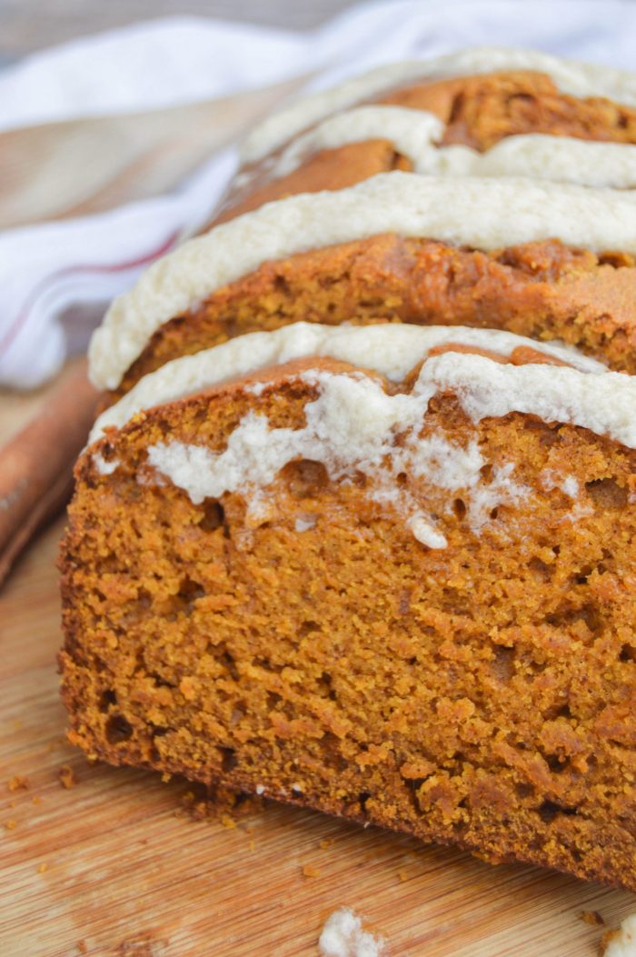  Pumpkin Bread with Maple Icing on a wooden board