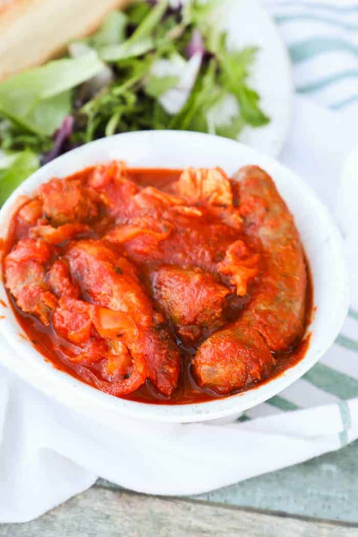 Slow Cooker Sausage Chicken and Peppers in a white bowl