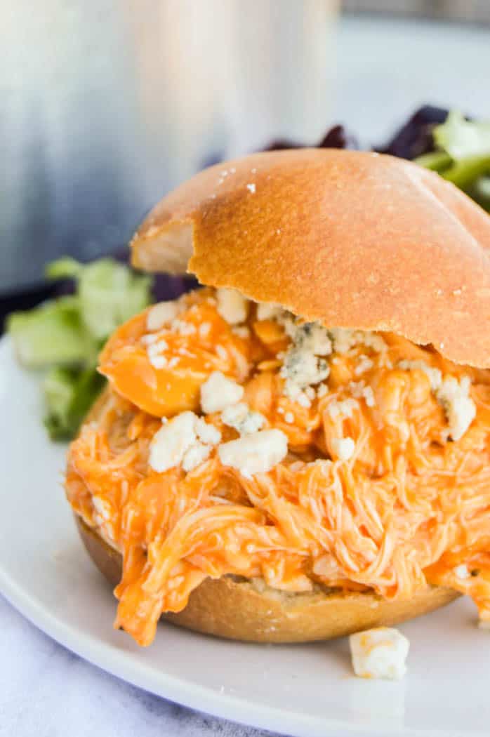 Slow Cooker Buffalo Chicken Sliders close up on white plate