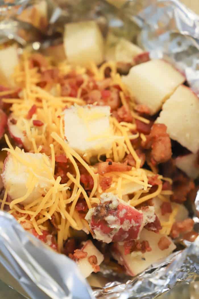 Slow Cooker Cheesy Ranch Potatoes in the slow cooker with foil