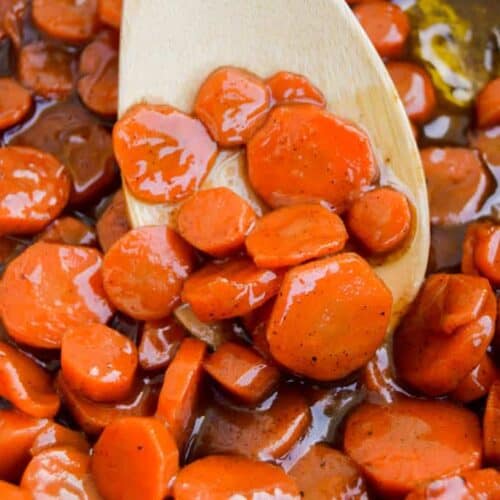 Brown Sugar Glazed Carrots on a wooden spoon