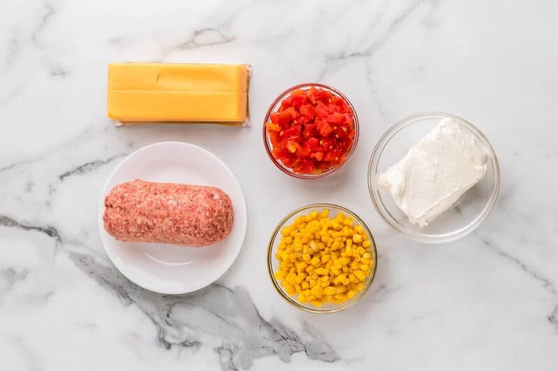 velveeta sausage dip ingredients on the counter