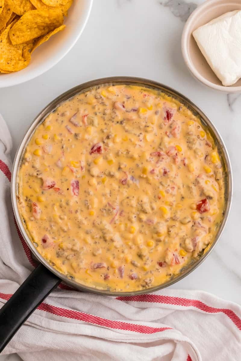 sausage cheese dip over top view in the skillet