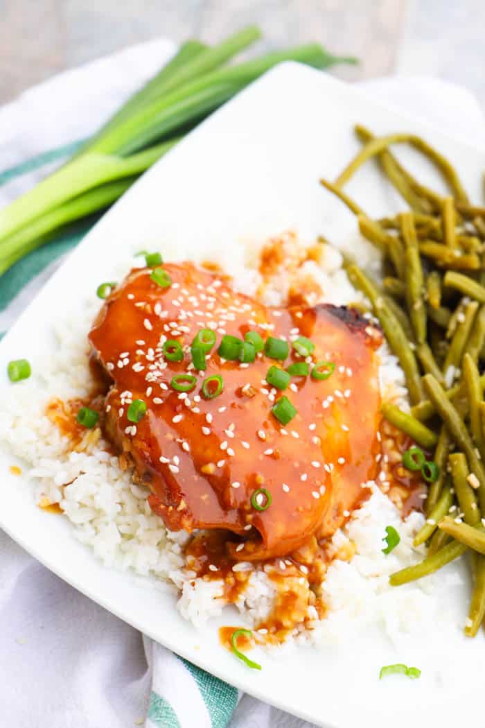 teriyaki chicken on bed of rice with green beans