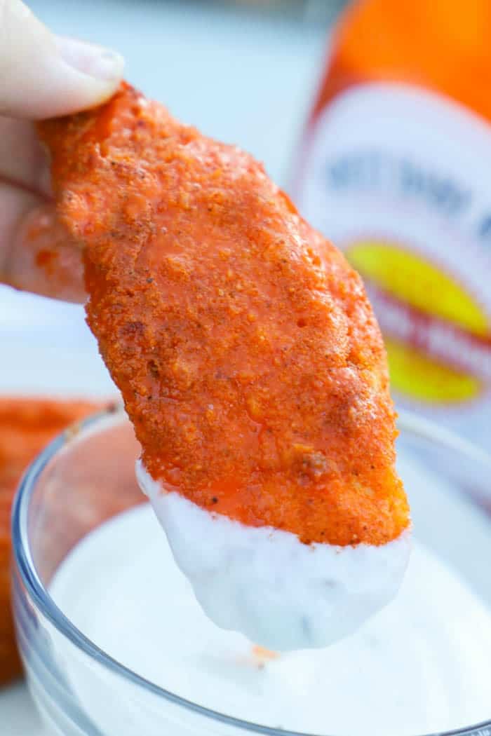 Buffalo Chicken Tenders dipped in ranch dressing.