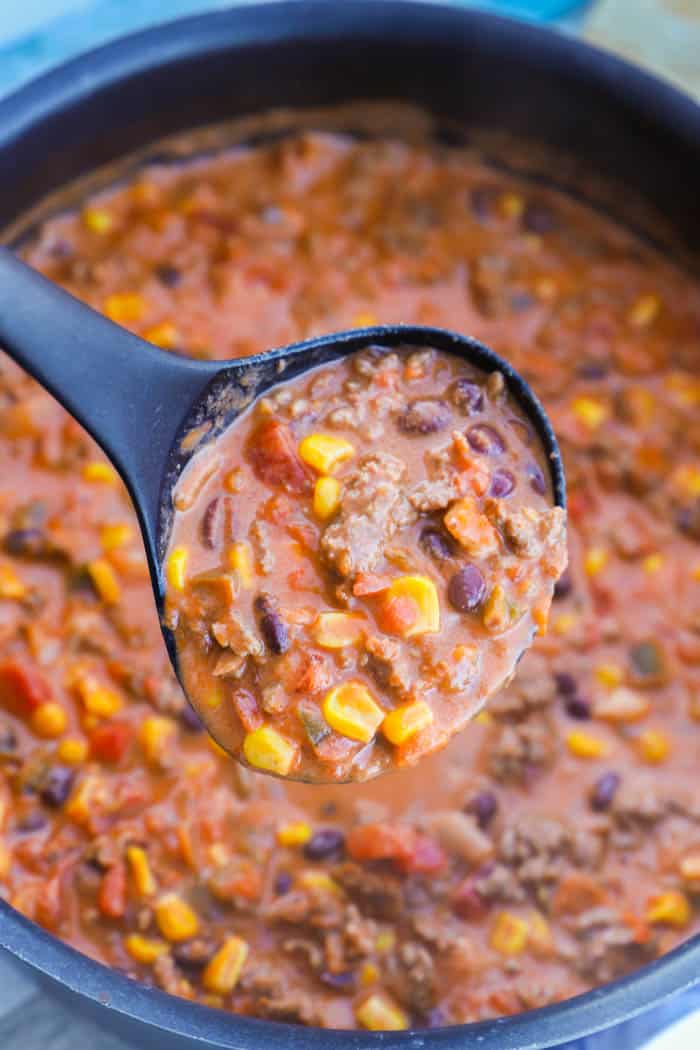 Creamy Taco Soup being scooped out with a ladle.