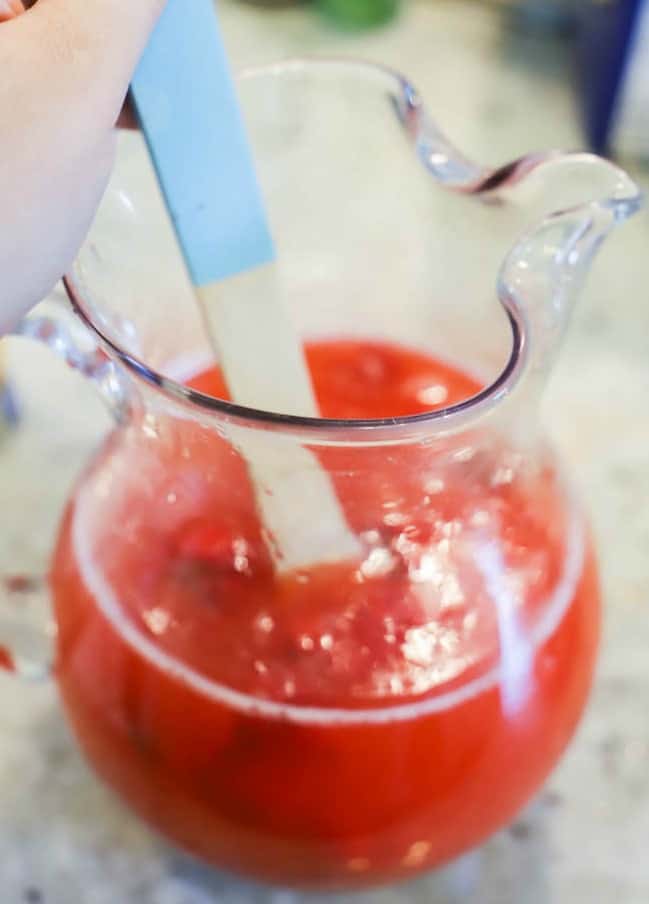 mixing Strawberry Lemonade