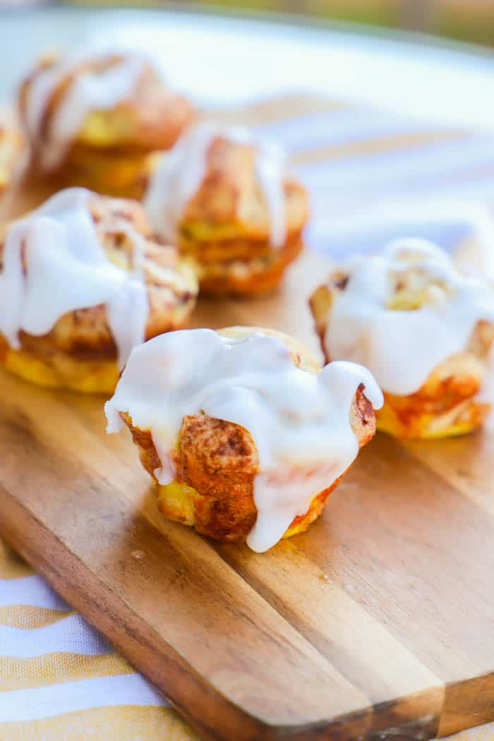 Cinnamon Roll Muffins on a wooden board