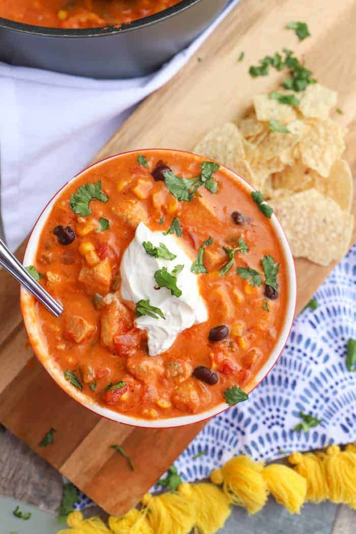 Creamy Chicken Taco Soup on wooden serving board 