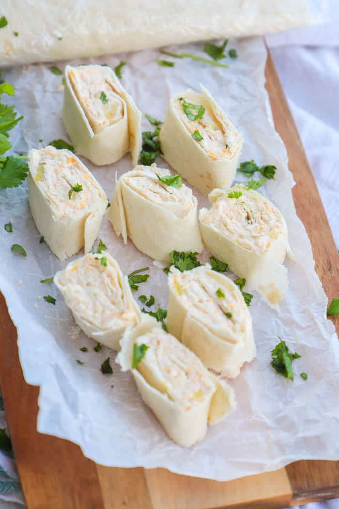 pinwheels on a wooden cutting board