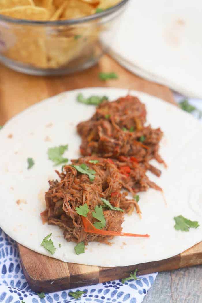 4 Ingredient Slow Cooker Steak Fajita on a tortilla wrap