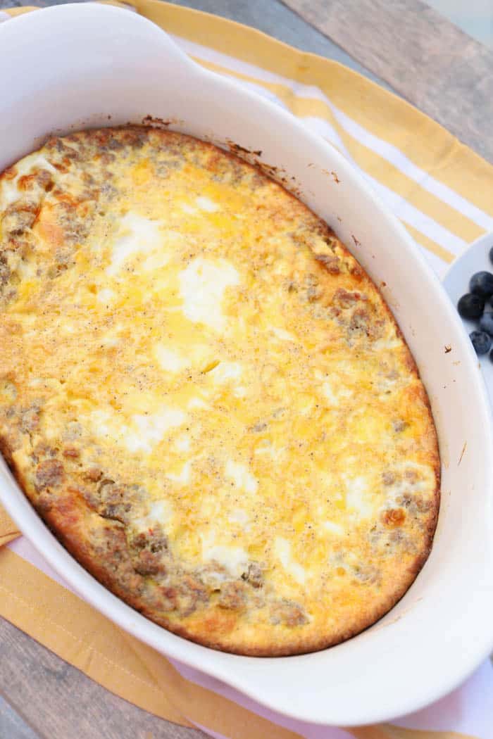 Cream Cheese Sausage Casserole in a white casserole dish