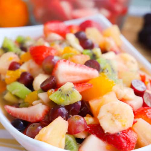 fruit salad in a white bowl