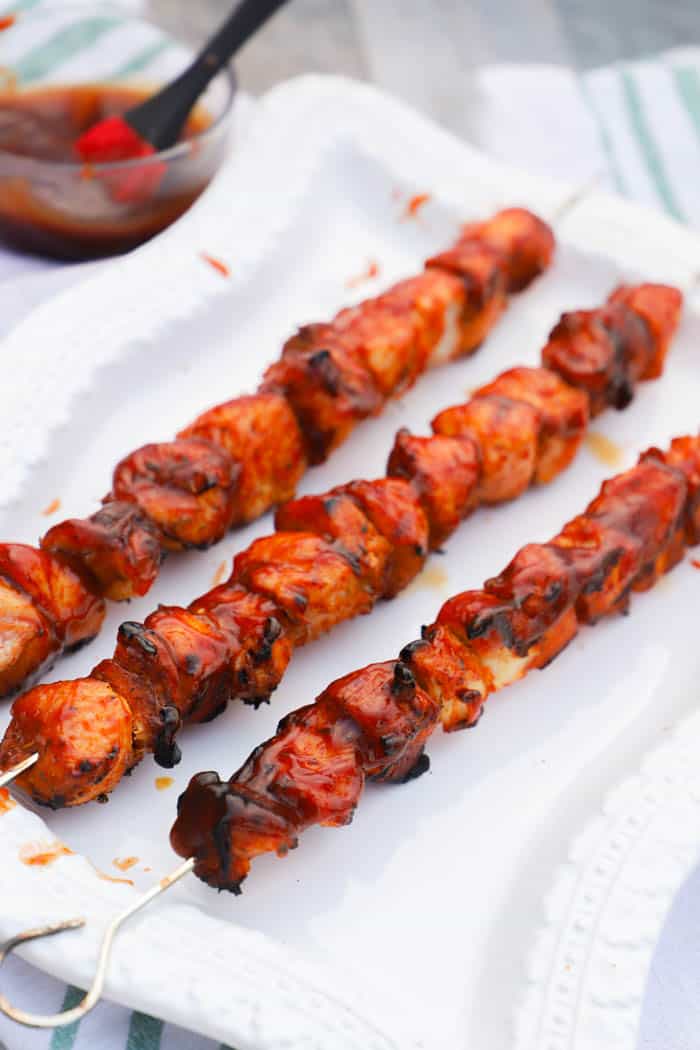 Grilled BBQ Chicken Kabobs on a white plater