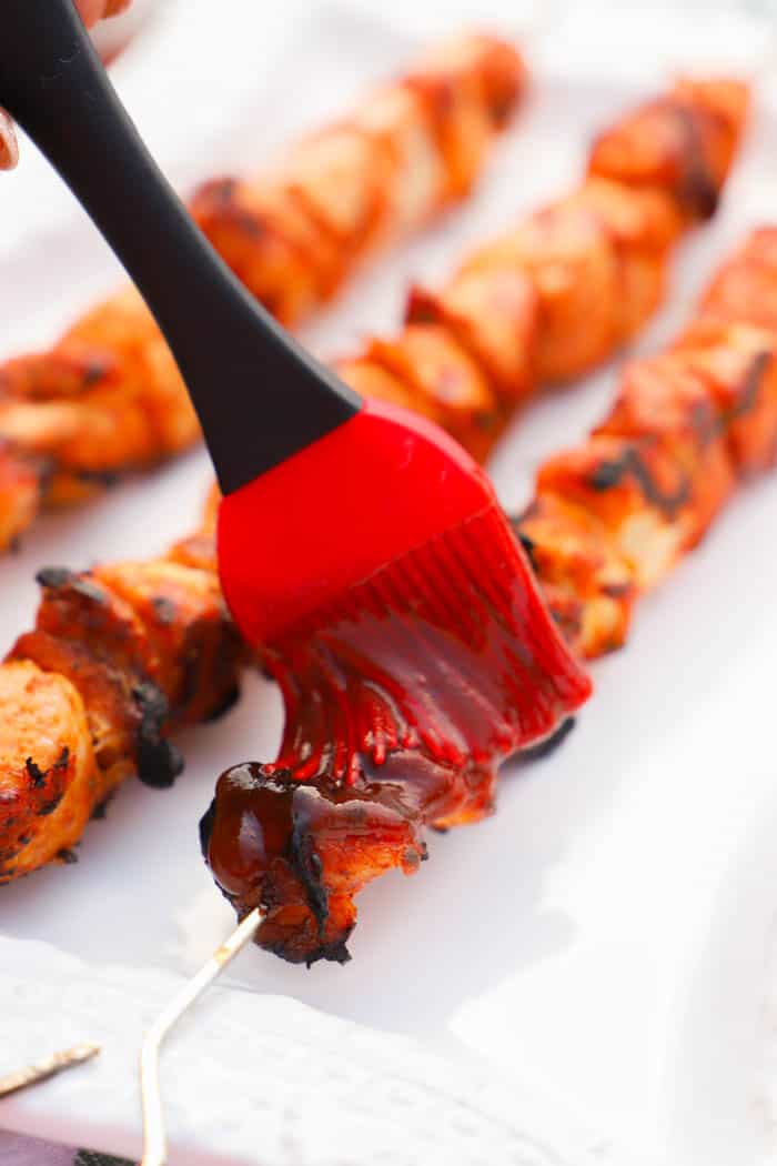 Grilled BBQ Chicken Kabobs with a bbq brush