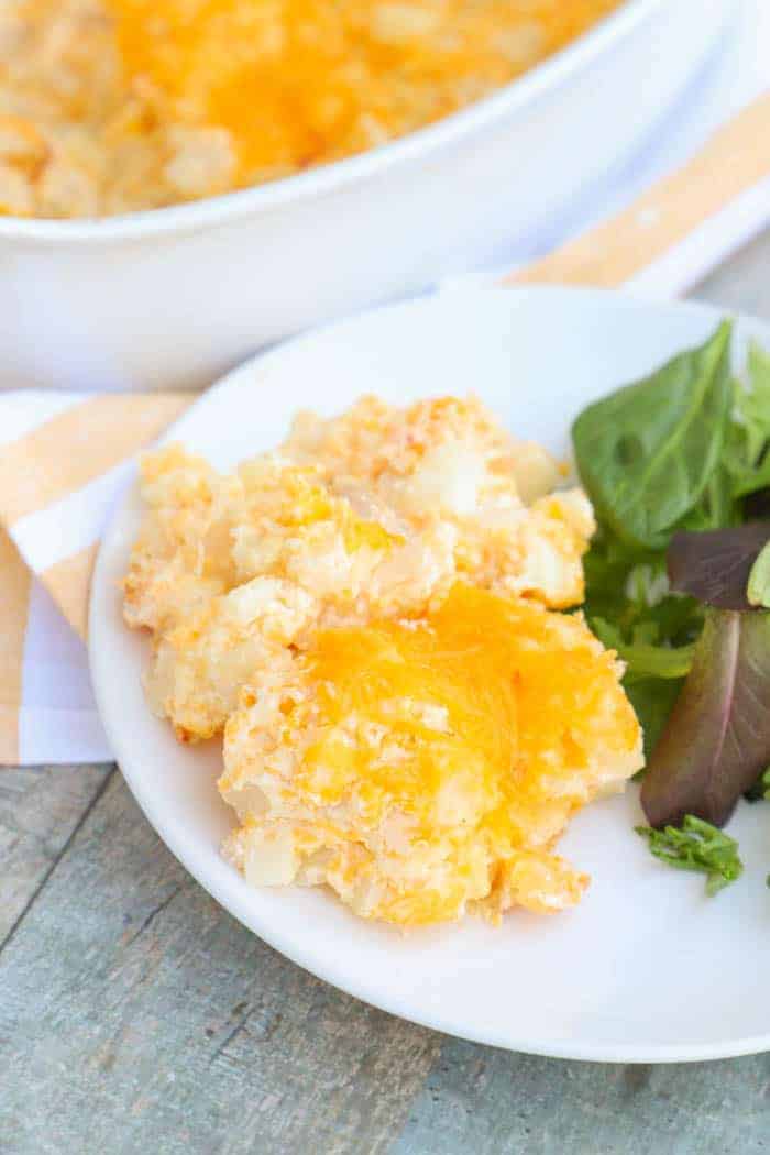 Cheesy Potato Casserole on w white plate