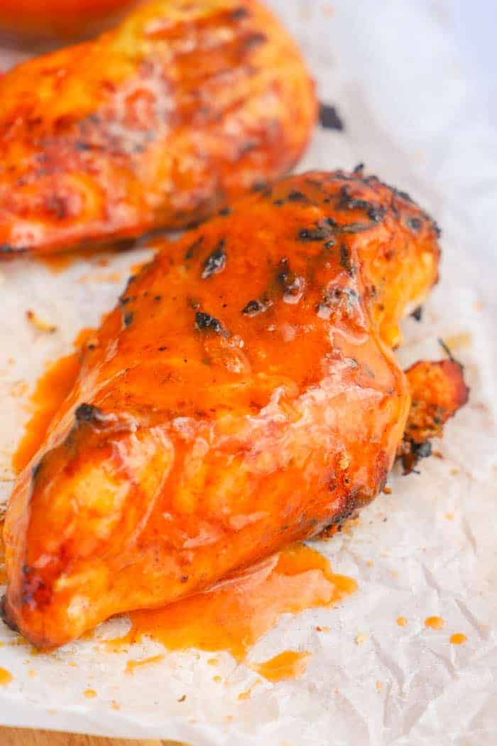 Up close photo of Grilled Buffalo Chicken on a cutting board