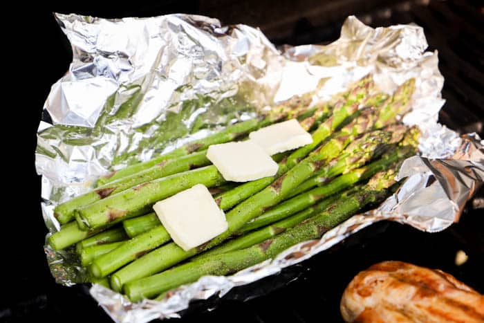 Grilled Asparagus on the grill with flames