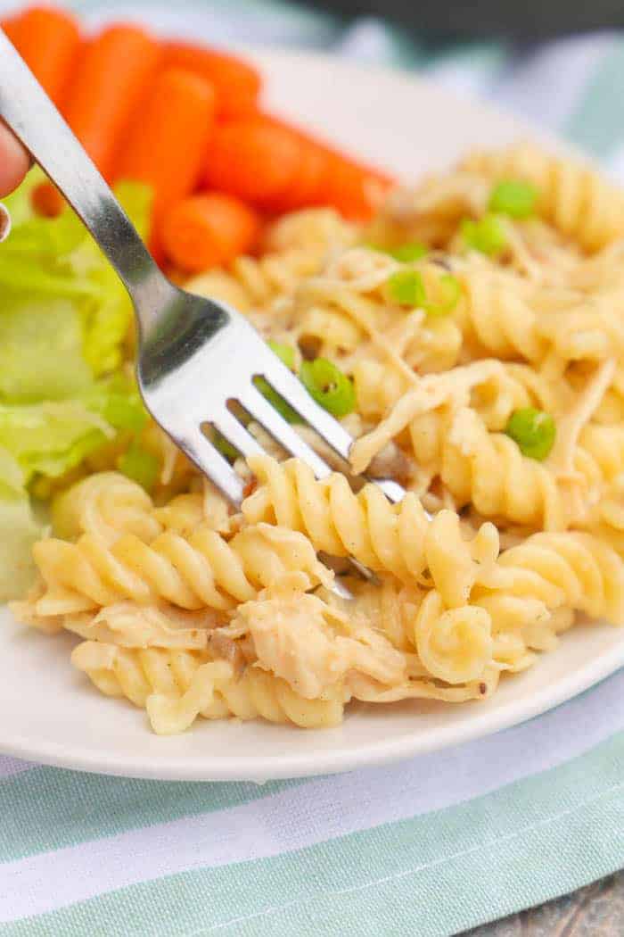eating Chicken Bacon Ranch Pasta with a fork