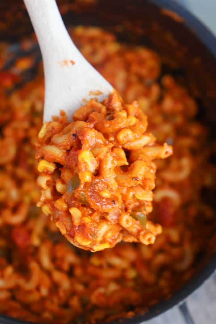 One Pot American Goulash in a wooden spoon