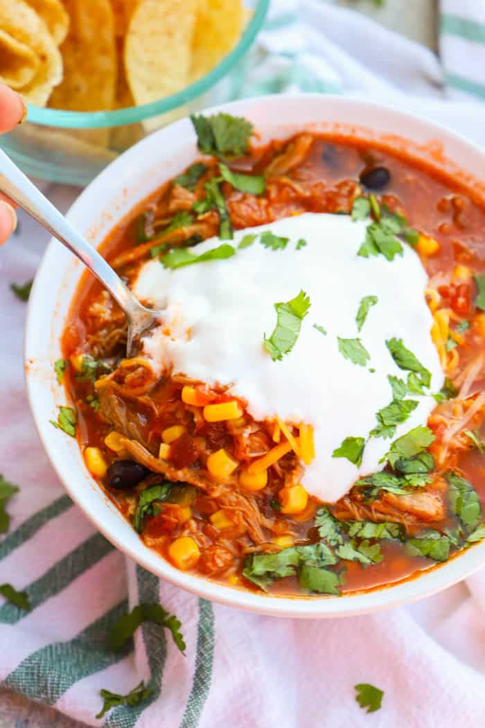 Using a spoon to eat Pulled Pork Taco Soup