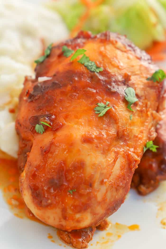 Close up Slow Cooker Catalina Chicken on a white plate