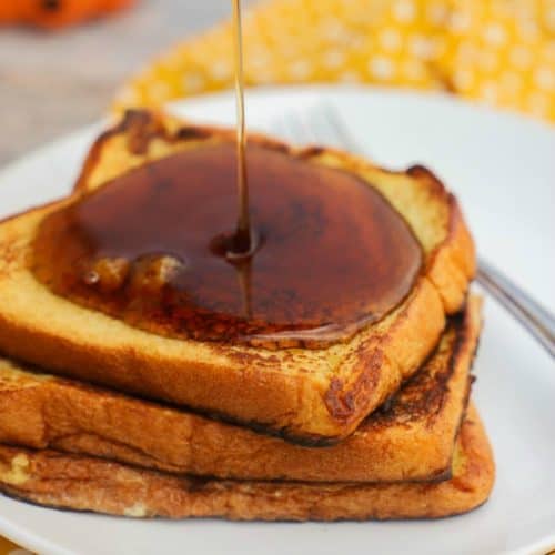 Pumpkin Spice French Toast pouring with syrup
