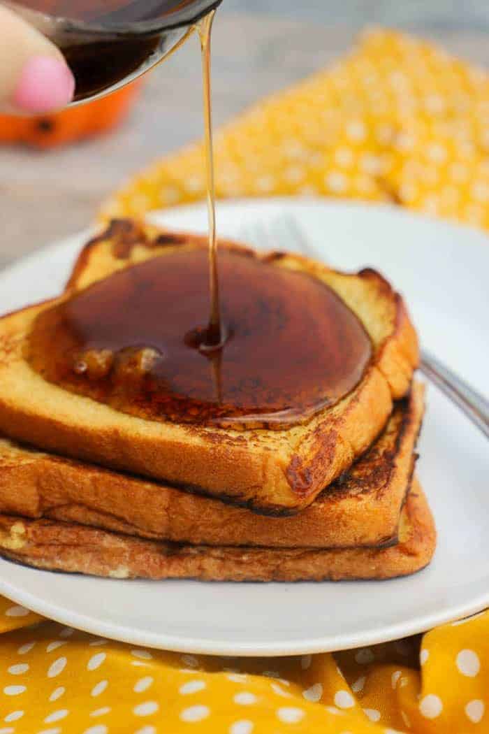 Pumpkin Spice French Toast pouring with syrup