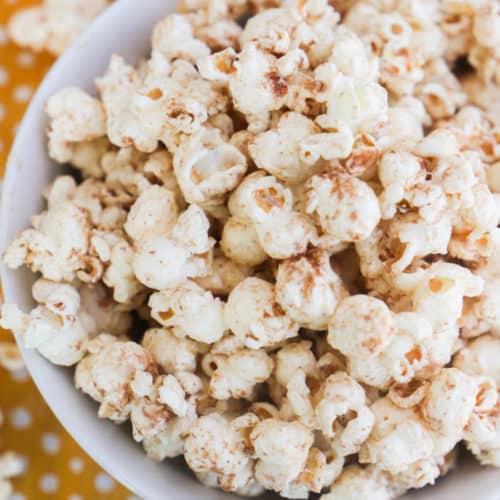 Pumpkin Spice Popcorn with a orange napkin