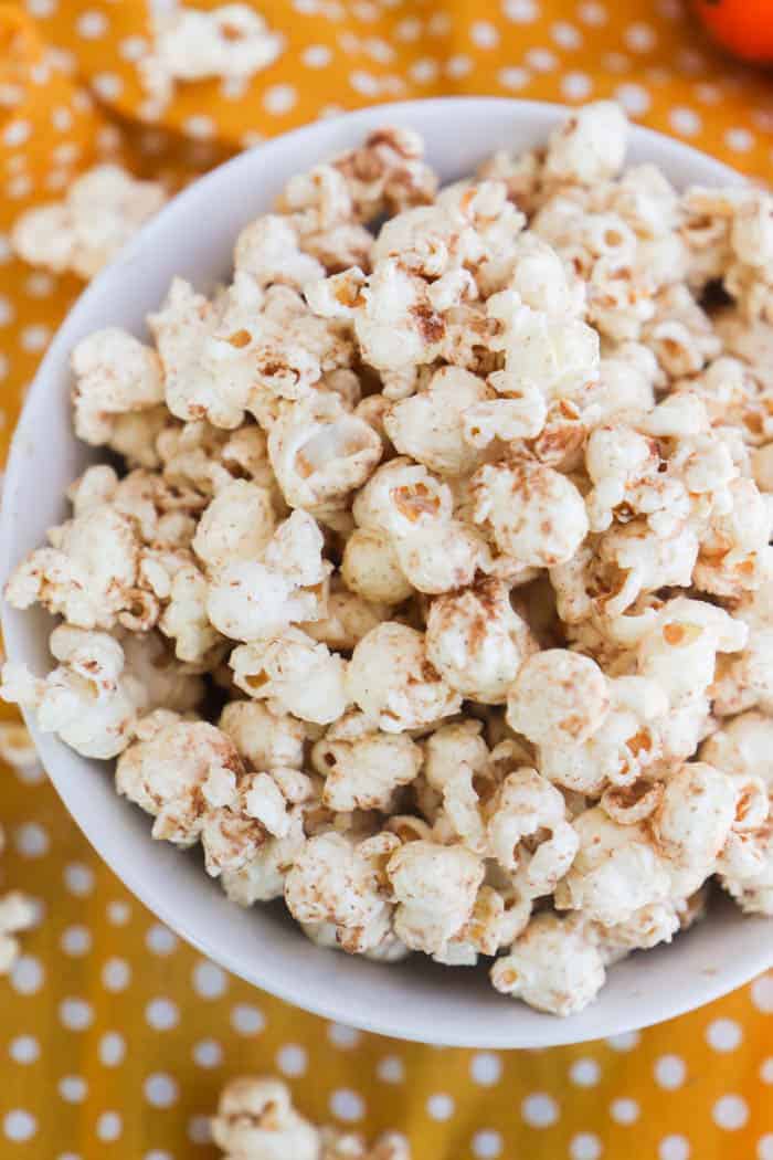 Pumpkin Spice Popcorn with a orange napkin