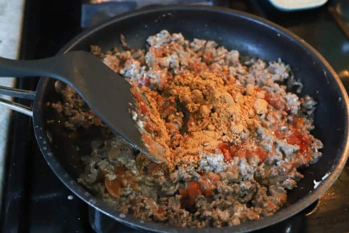 cooking beef in a skillet