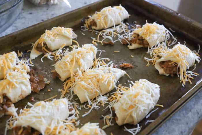 Taco Roll-Ups topped with cheese