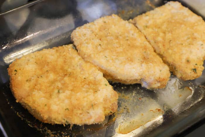 Parmesan Crusted Pork Chops in a baking dish