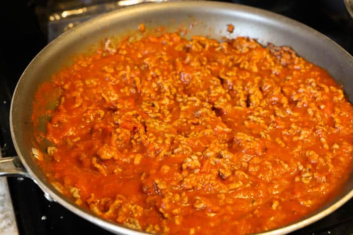 cooked ground beef and sauce