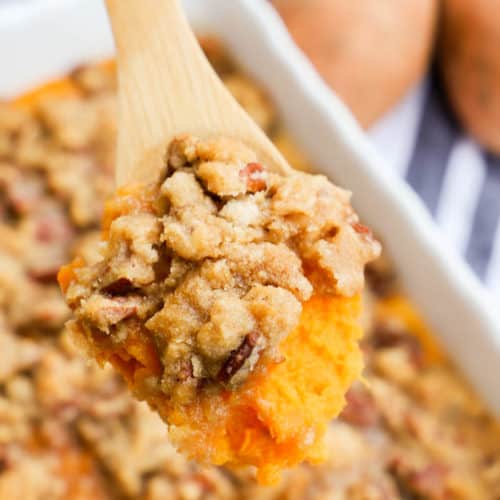 Sweet Potato Casserole in a wooden spoon