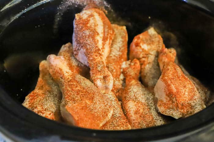 seasoned Slow Cooker BBQ Chicken Legs in the slow cooker
