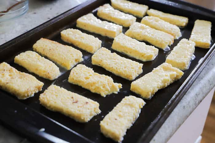 egg washed bread on a baking sheet